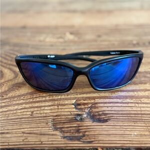 Costa Del Mar turbine sunglasses with black frame and blue lens